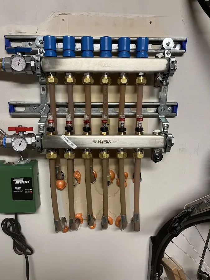 Plumber performing Water Heater Repair at a residential property in Green Cove Springs